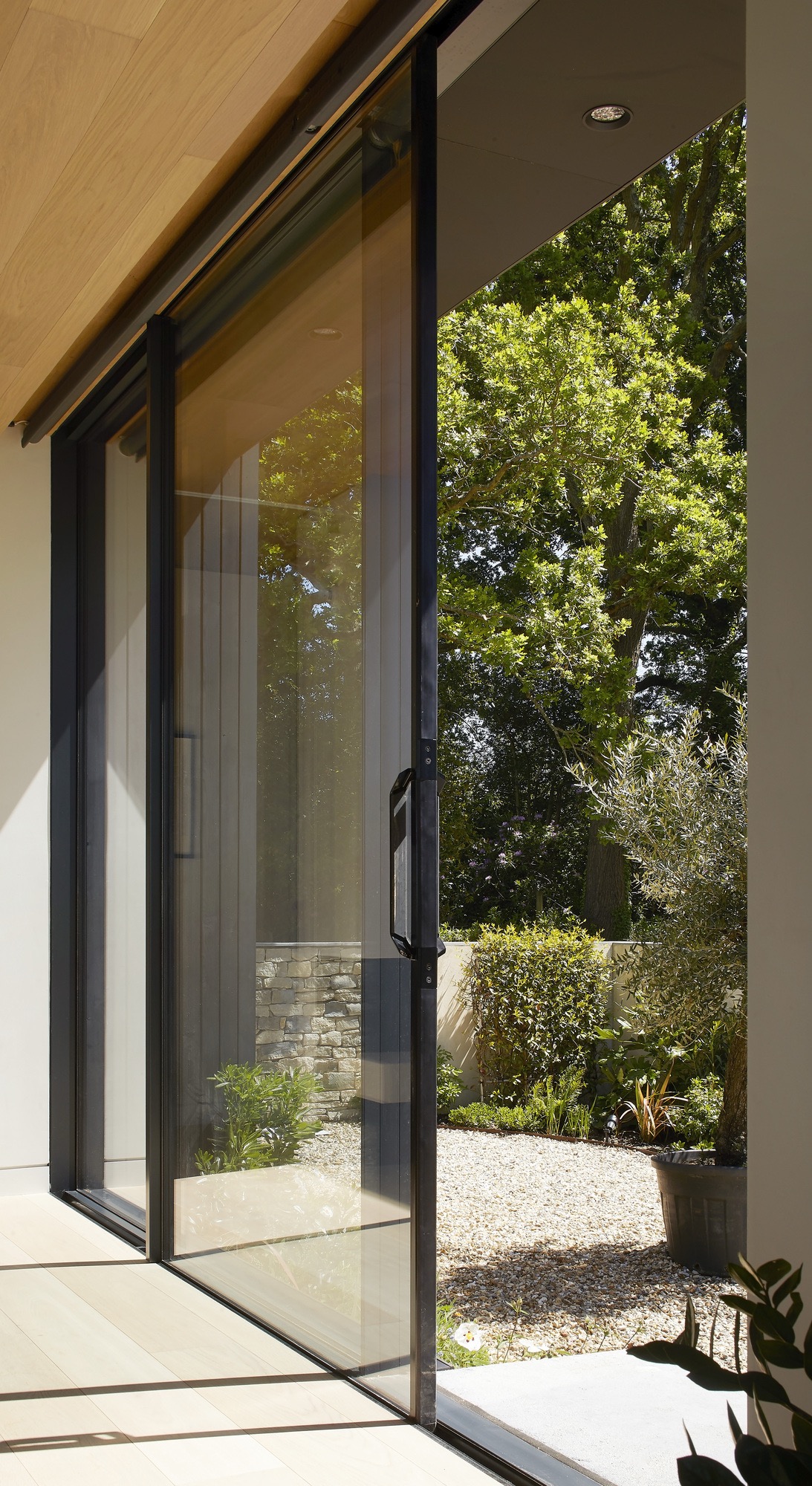 Corner sliding door system